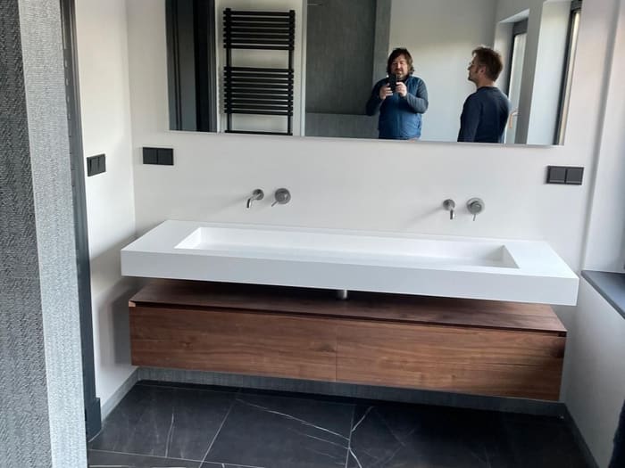 The contractor admiring his work, bathroom in Utrecht