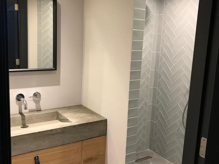 Luxury bathroom with geometric tiling, Amsterdam