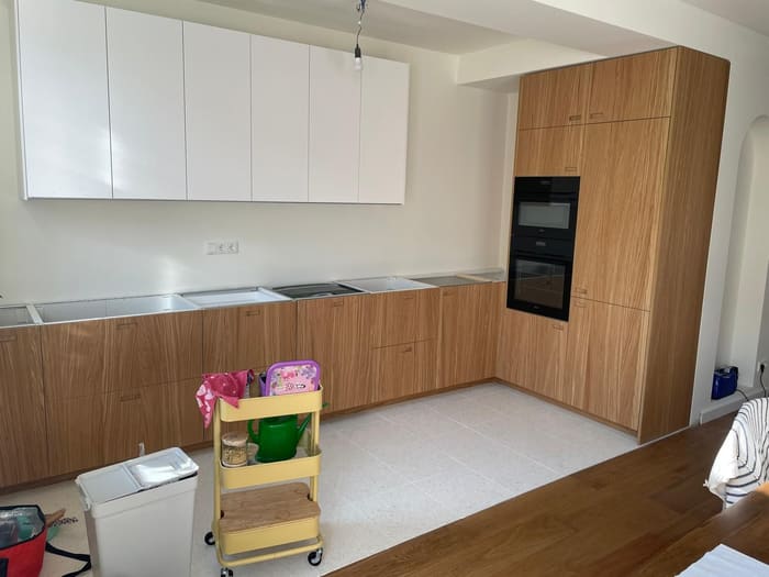 Installing the kitchen, flooring and plastering
